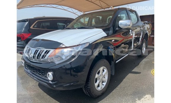 Buy Import Mitsubishi L200 Black Car in Import - Dubai in Dhufar Buy Import Mitsubishi L200 Black Car in Import - Dubai in Dhufar