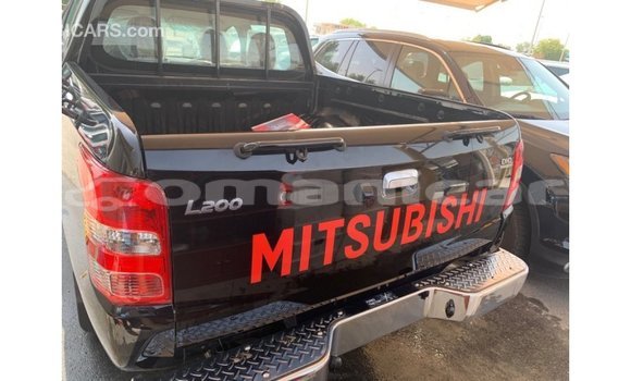 Buy Import Mitsubishi L200 Black Car in Import - Dubai in Dhufar Buy Import Mitsubishi L200 Black Car in Import - Dubai in Dhufar
