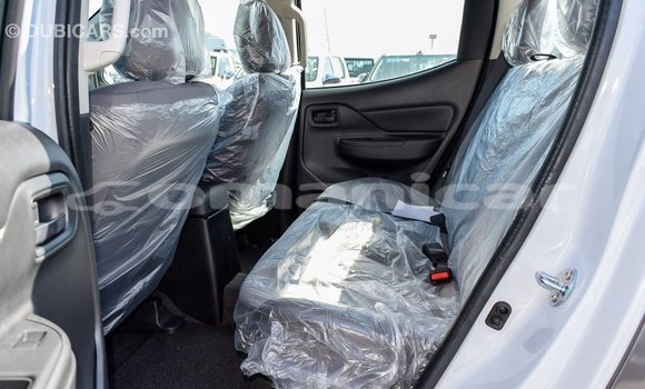 Buy Import Mitsubishi L200 White Car in Import - Dubai in Dhufar Buy Import Mitsubishi L200 White Car in Import - Dubai in Dhufar