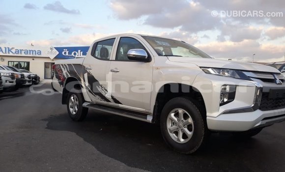 Buy Import Mitsubishi L200 White Car in Import - Dubai in Dhufar Buy Import Mitsubishi L200 White Car in Import - Dubai in Dhufar