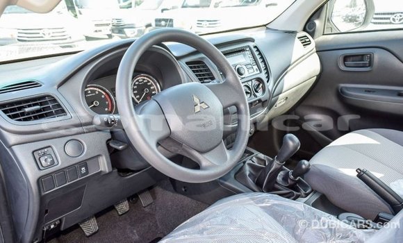 Buy Import Mitsubishi L200 White Car in Import - Dubai in Dhufar Buy Import Mitsubishi L200 White Car in Import - Dubai in Dhufar