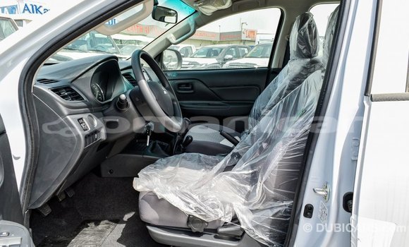 Buy Import Mitsubishi L200 White Car in Import - Dubai in Dhufar Buy Import Mitsubishi L200 White Car in Import - Dubai in Dhufar