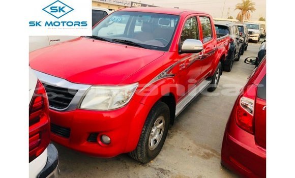 Buy Import Toyota Hilux Red Car in Import - Dubai in Dhufar