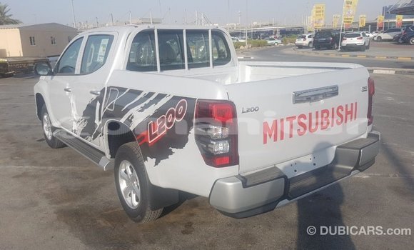 Buy Import Mitsubishi L200 White Car in Import - Dubai in Dhufar Buy Import Mitsubishi L200 White Car in Import - Dubai in Dhufar