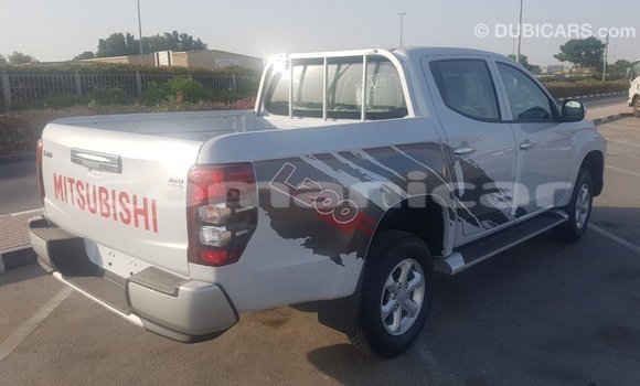 Buy Import Mitsubishi L200 White Car in Import - Dubai in Dhufar Buy Import Mitsubishi L200 White Car in Import - Dubai in Dhufar