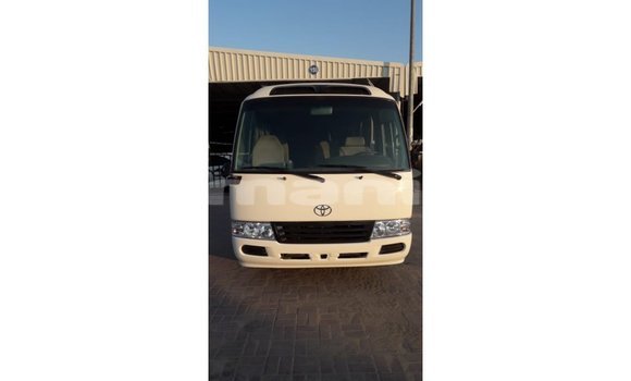 Buy Import Toyota Coaster White Car in Import - Dubai in Dhufar