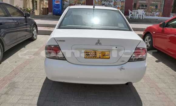Buy Used Mitsubishi Lancer White Car in Masqat in Masqat Buy Used Mitsubishi Lancer White Car in Masqat in Masqat