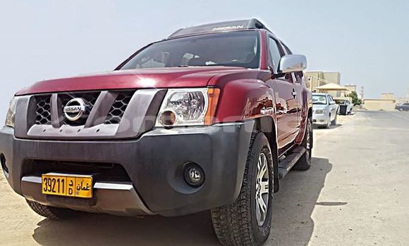 Buy Used Nissan Xterra Red Car in Muscat in Masqat