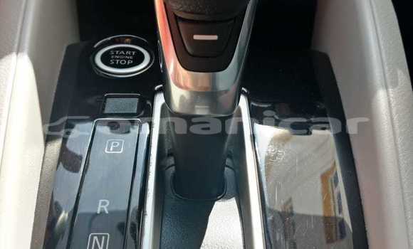 Buy Used Nissan Sunny White Car in Qurm in Masqat Buy Used Nissan Sunny White Car in Qurm in Masqat