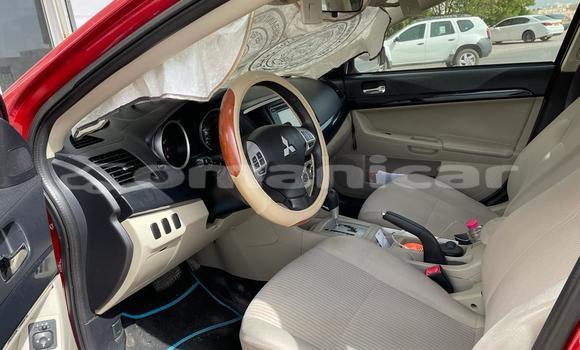 Buy Used Mitsubishi Lancer Red Car in Masqat in Masqat
