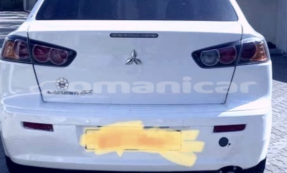 Buy Used Mitsubishi Lancer White Car in Qurm in Masqat