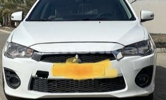 Buy Used Mitsubishi Lancer White Car in Qurm in Masqat Buy Used Mitsubishi Lancer White Car in Qurm in Masqat