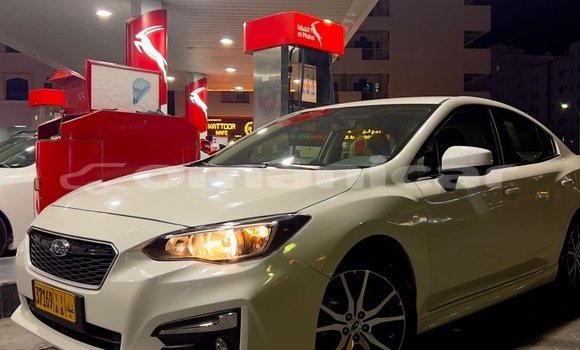 Buy Used Subaru Impreza White Car in Muscat in Masqat