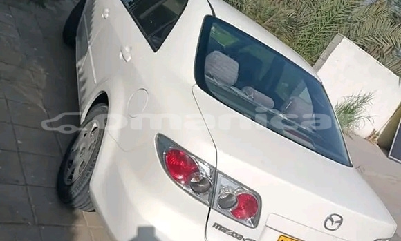 Buy Used Mazda 326 White Car in Khasab in Musandam Buy Used Mazda 326 White Car in Khasab in Musandam