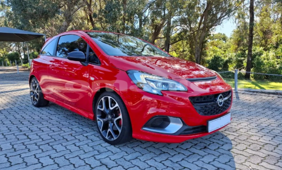 Buy Used Opel Corsa Red Car in Muscat in Masqat
