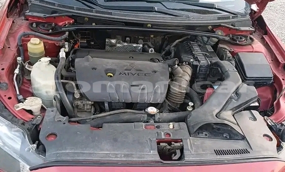 Buy Used Mitsubishi Lancer Red Car in Ruwi in Masqat Buy Used Mitsubishi Lancer Red Car in Ruwi in Masqat