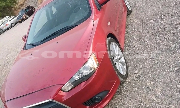 Buy Used Mitsubishi Lancer Red Car in Ruwi in Masqat Buy Used Mitsubishi Lancer Red Car in Ruwi in Masqat