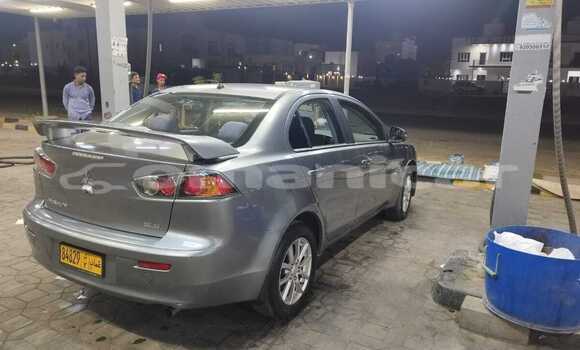 Buy Used Mitsubishi Lancer Silver Car in Muscat in Masqat Buy Used Mitsubishi Lancer Silver Car in Muscat in Masqat