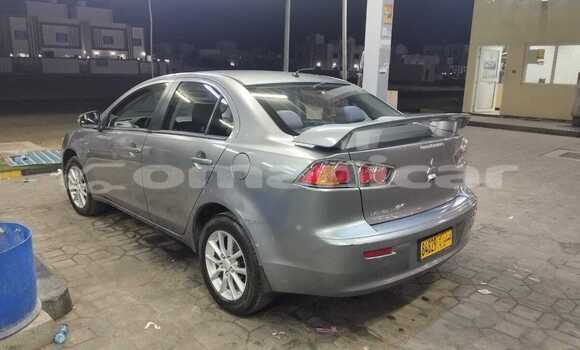 Buy Used Mitsubishi Lancer Silver Car in Muscat in Masqat Buy Used Mitsubishi Lancer Silver Car in Muscat in Masqat