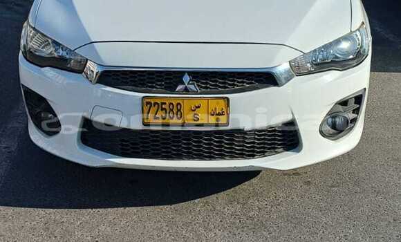 Buy Used Mitsubishi Lancer White Car in Muscat in Masqat