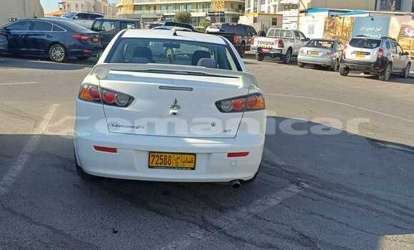 Buy Used Mitsubishi Lancer White Car in Muscat in Masqat Buy Used Mitsubishi Lancer White Car in Muscat in Masqat