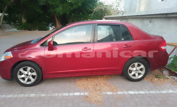 Buy Import Nissan Tiida Red Car in Muscat in Masqat Buy Import Nissan Tiida Red Car in Muscat in Masqat