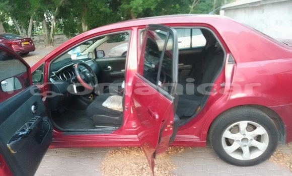 Buy Import Nissan Tiida Red Car in Muscat in Masqat Buy Import Nissan Tiida Red Car in Muscat in Masqat