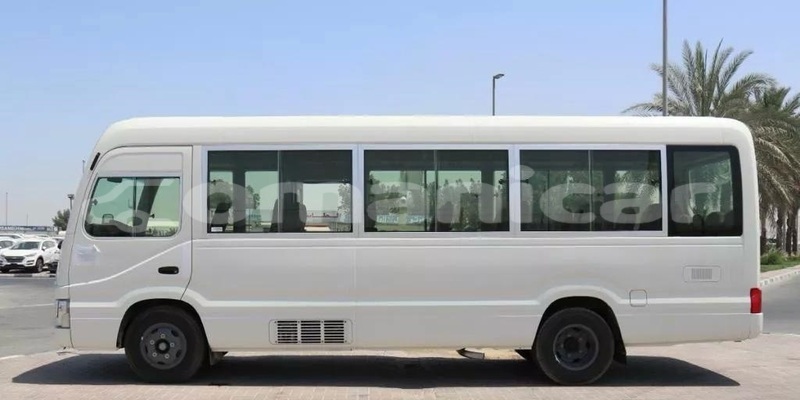 Big with watermark toyota coaster masqat muscat 7987