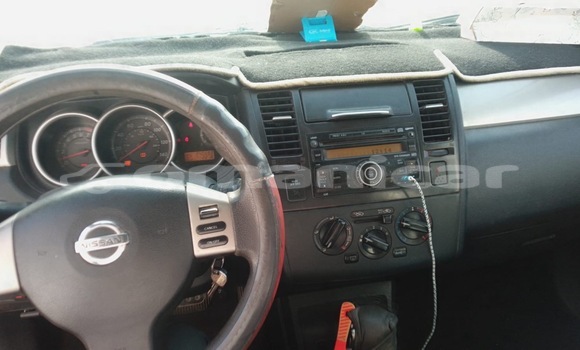 Buy Import Nissan Tiida Red Car in Muscat in Masqat Buy Import Nissan Tiida Red Car in Muscat in Masqat