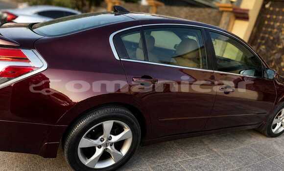 Buy Used Nissan Altima Red Car in Wadi Al Kabir in Masqat Buy Used Nissan Altima Red Car in Wadi Al Kabir in Masqat