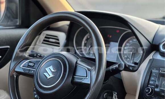Buy Used Suzuki Dzire White Car in al–Khaburah in al-Batinah Buy Used Suzuki Dzire White Car in al–Khaburah in al-Batinah
