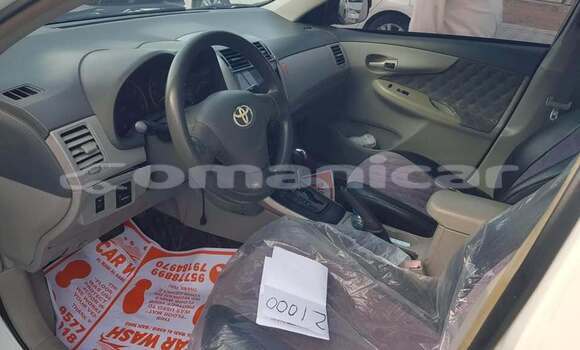 Buy Used Toyota Corolla White Car in as–Sib in Masqat Buy Used Toyota Corolla White Car in as–Sib in Masqat
